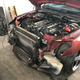 Oil cooler, AC condenser, radiator, and power steering cooler. Full-on racecar stuff here.